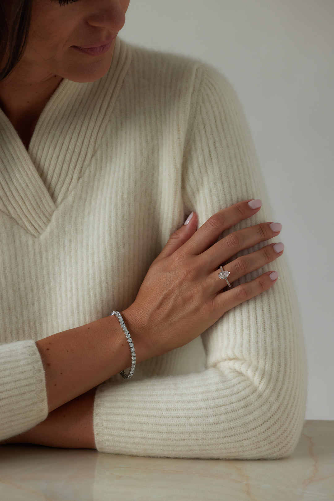 Elegant pear cut engagement ring by IRALIS – Zurich-designed fine jewelry with pave setting, DEF color and VS1–VS2 clarity.