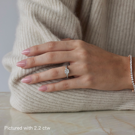 Asscher brilliant cut engagement ring by IRALIS featuring lab-grown diamonds with DEF color and VS1–VS2 clarity, Zurich designed