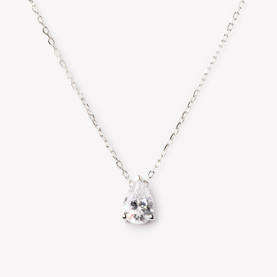 Elegant pear cut necklace by IRALIS featuring lab-grown DEF color diamonds in 18k gold, Zurich designed on model