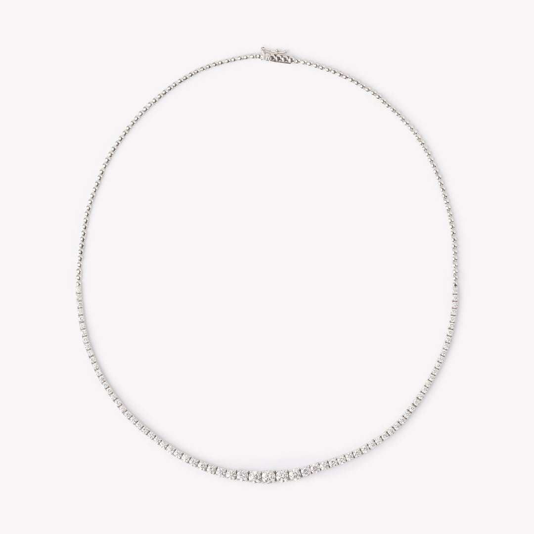 Round brilliant cut tennis necklace by IRALIS featuring lab-grown DEF color diamonds in four-prong setting, Zurich designed on model