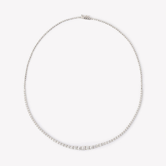 Round brilliant cut tennis necklace by IRALIS featuring lab-grown DEF color diamonds in four-prong setting, Zurich designed on model