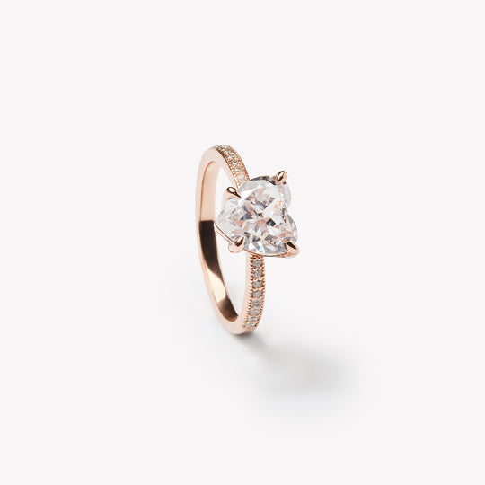 Heart cut engagement ring by IRALIS with pave setting, lab-grown diamonds in DEF color and VS1–VS2 clarity, Zurich designed