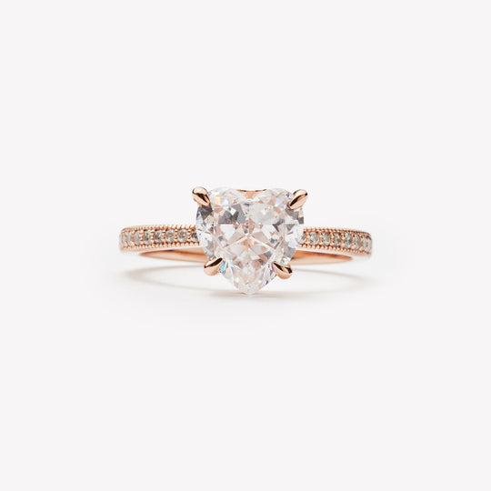 Heart cut engagement ring by IRALIS with pave setting, lab-grown diamonds in DEF color and VS1–VS2 clarity, Zurich designed