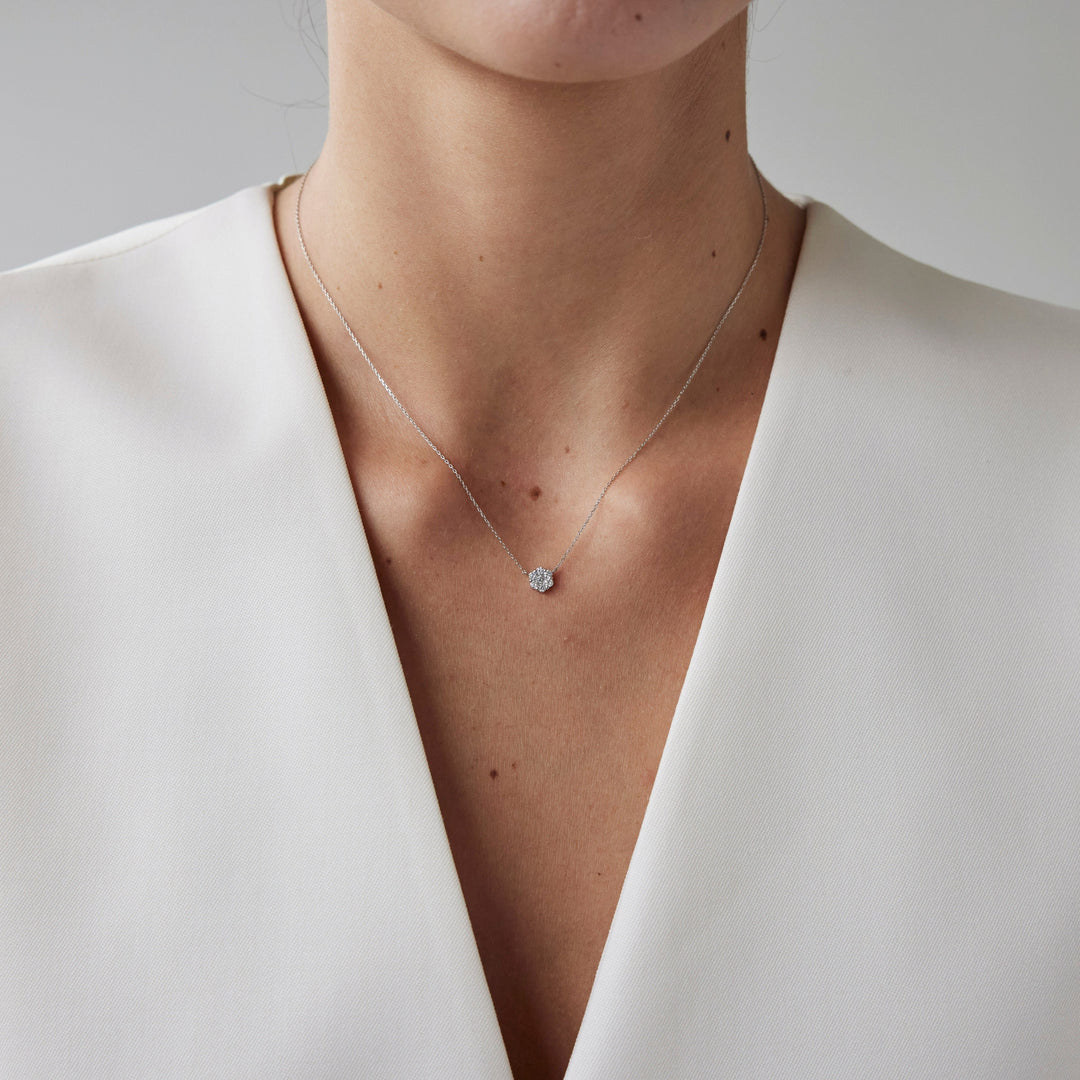 Elegant round brilliant cut necklace by IRALIS featuring lab-grown DEF color diamonds, Zurich designed on model