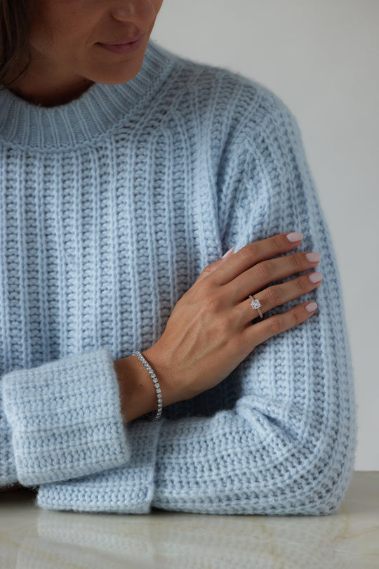 Princess cut engagement ring by IRALIS featuring lab-grown diamonds in DEF color and VS1–VS2 clarity, Zurich designed