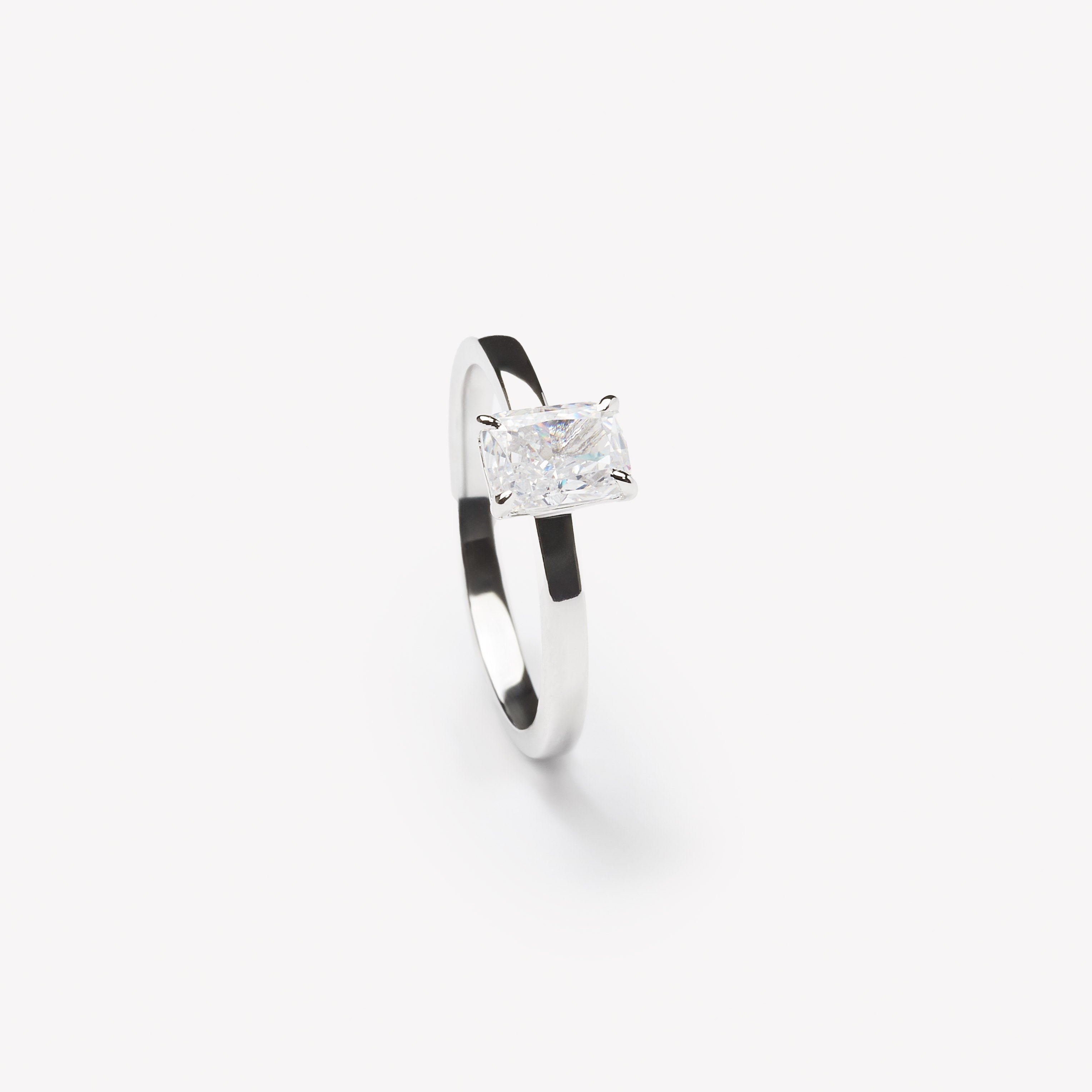 Radiant cut engagement ring by IRALIS featuring lab-grown diamonds in DEF color, VS1–VS2 clarity, Zurich designed