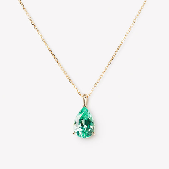 Pear cut necklace by IRALIS featuring lab-grown Paraiba stones in vibrant turquoise, Zurich designed and custom made

