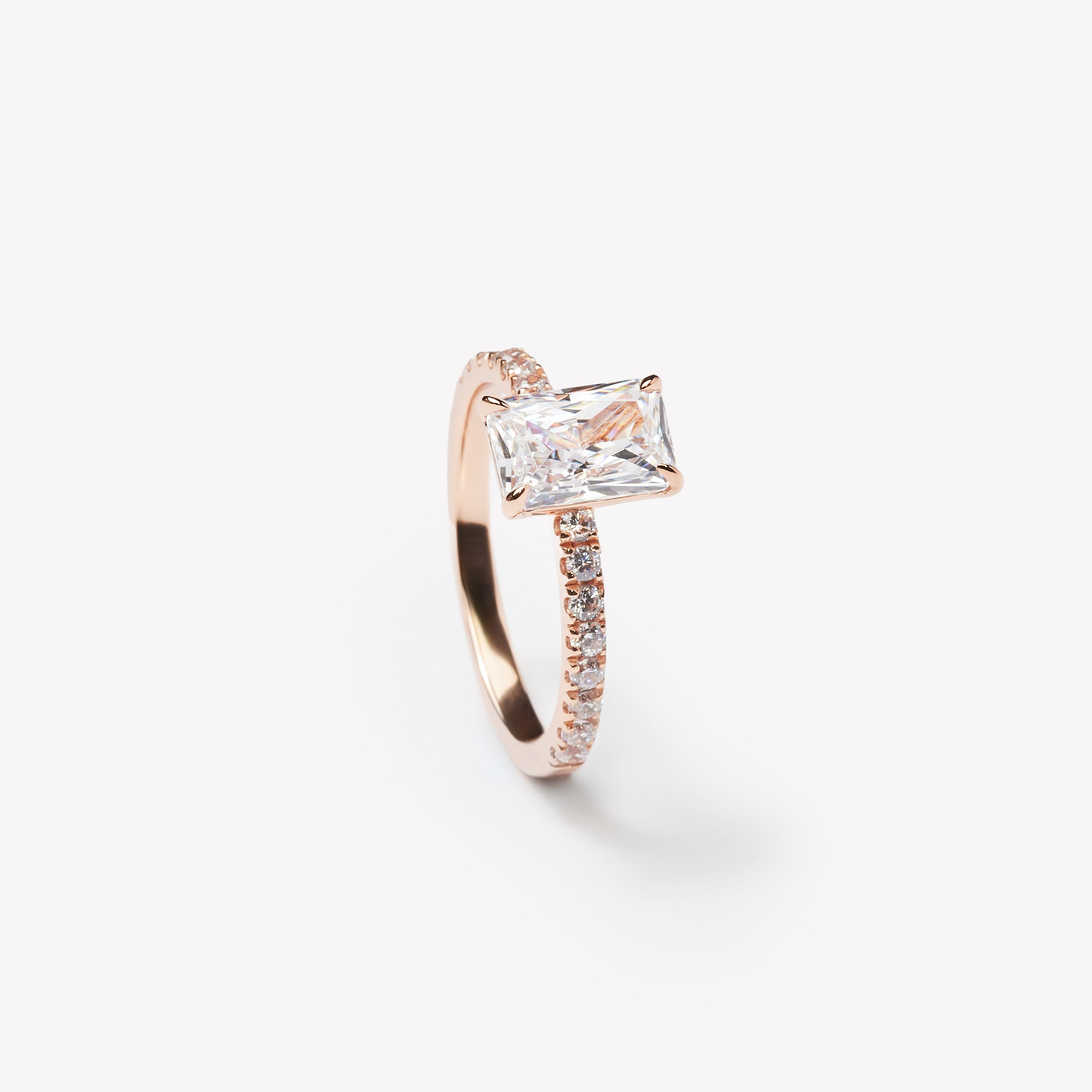 Radiant cut engagement ring featuring pave band by IRALIS – Zurich-designed fine jewelry with DEF color and VS1–VS2 clarity.