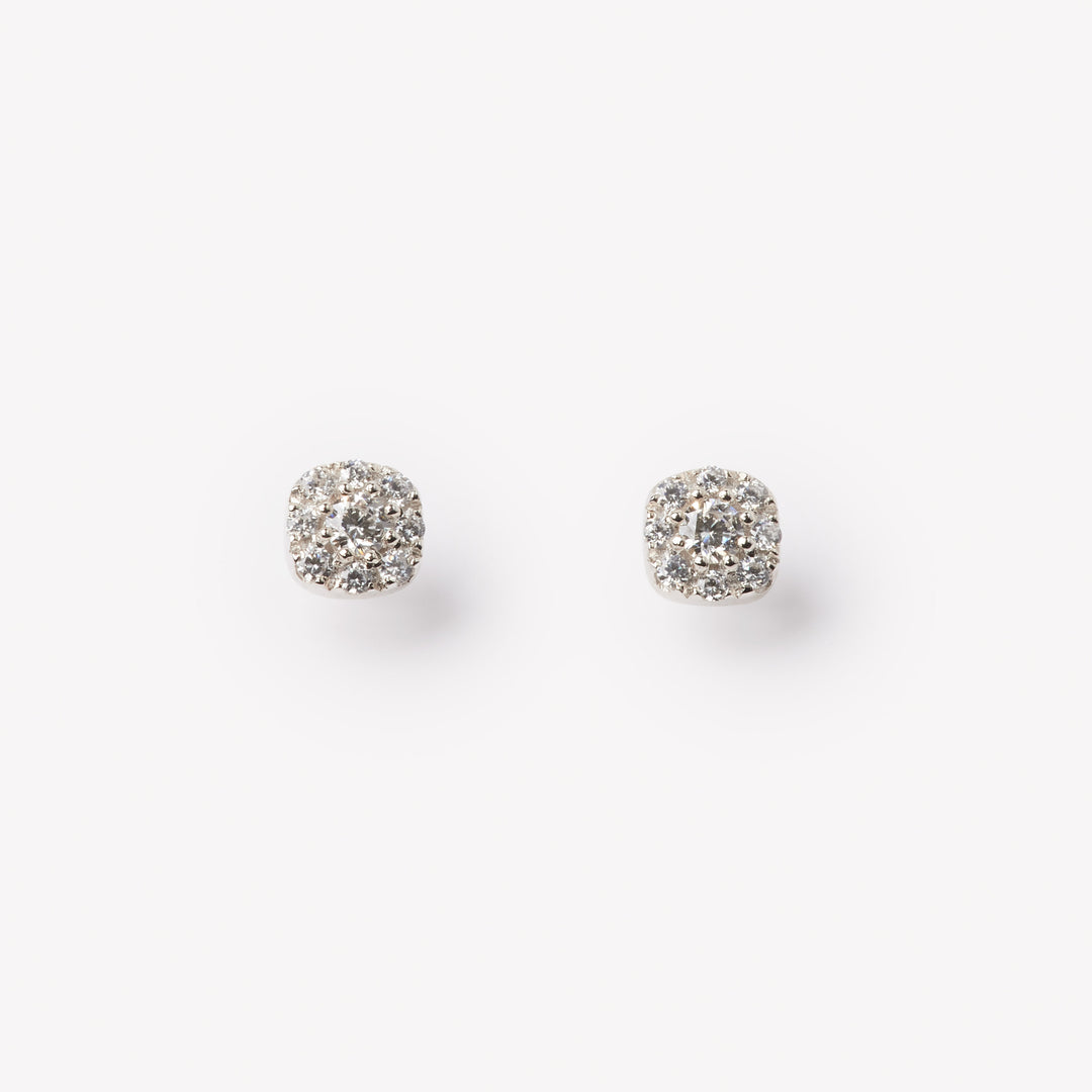 18k gold la grown diamond studs with round brilliant diamonds. Designed in Zurich. 