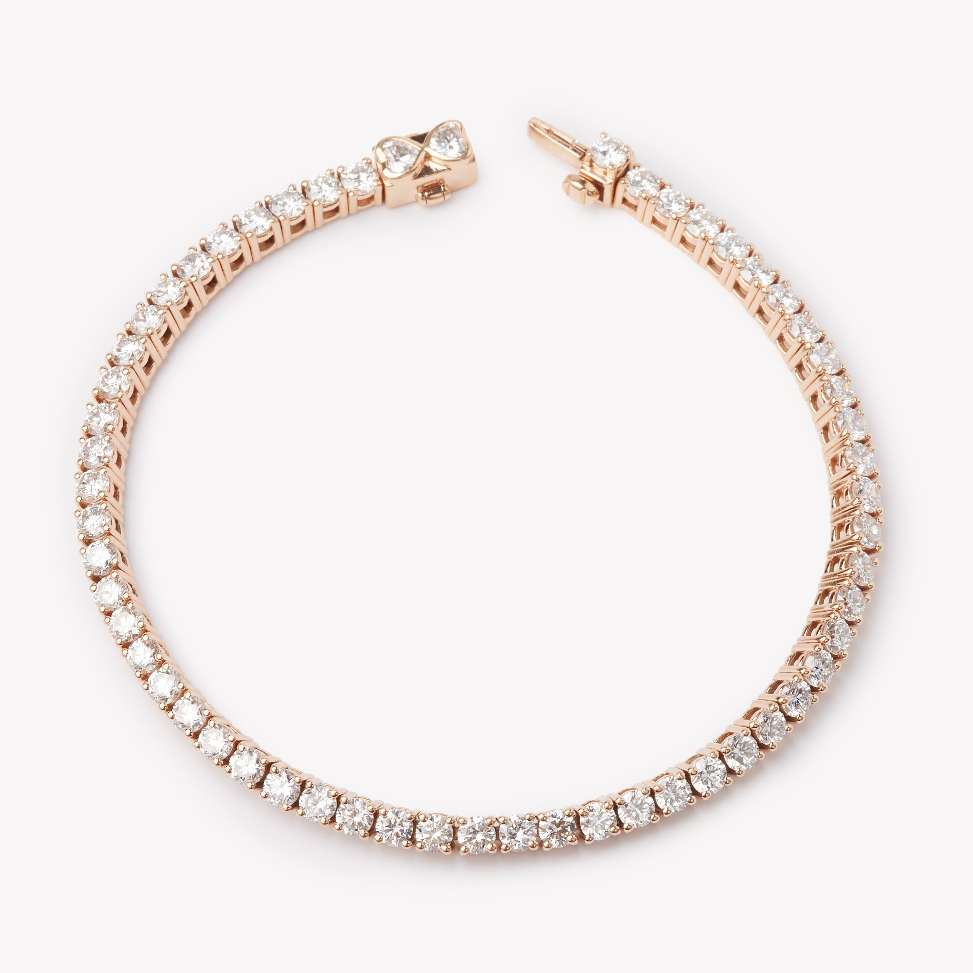 Classic 18k rose gold tennis bracelet with lab grown diamonds for timeless sophistication.