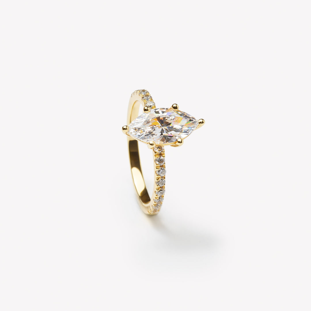 Elegant marquise cut engagement ring by IRALIS – Zurich-designed fine jewelry, featuring pave setting and VS1–VS2 clarity.