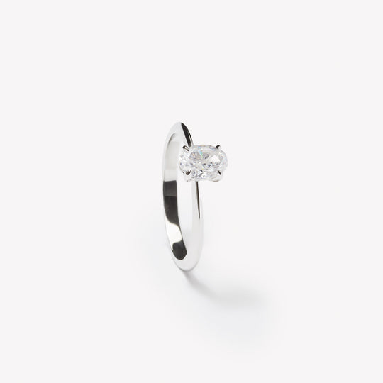 Oval cut engagement ring by IRALIS – Zurich-designed fine jewelry with plain knife setting, DEF color and VS1–VS2 clarity.