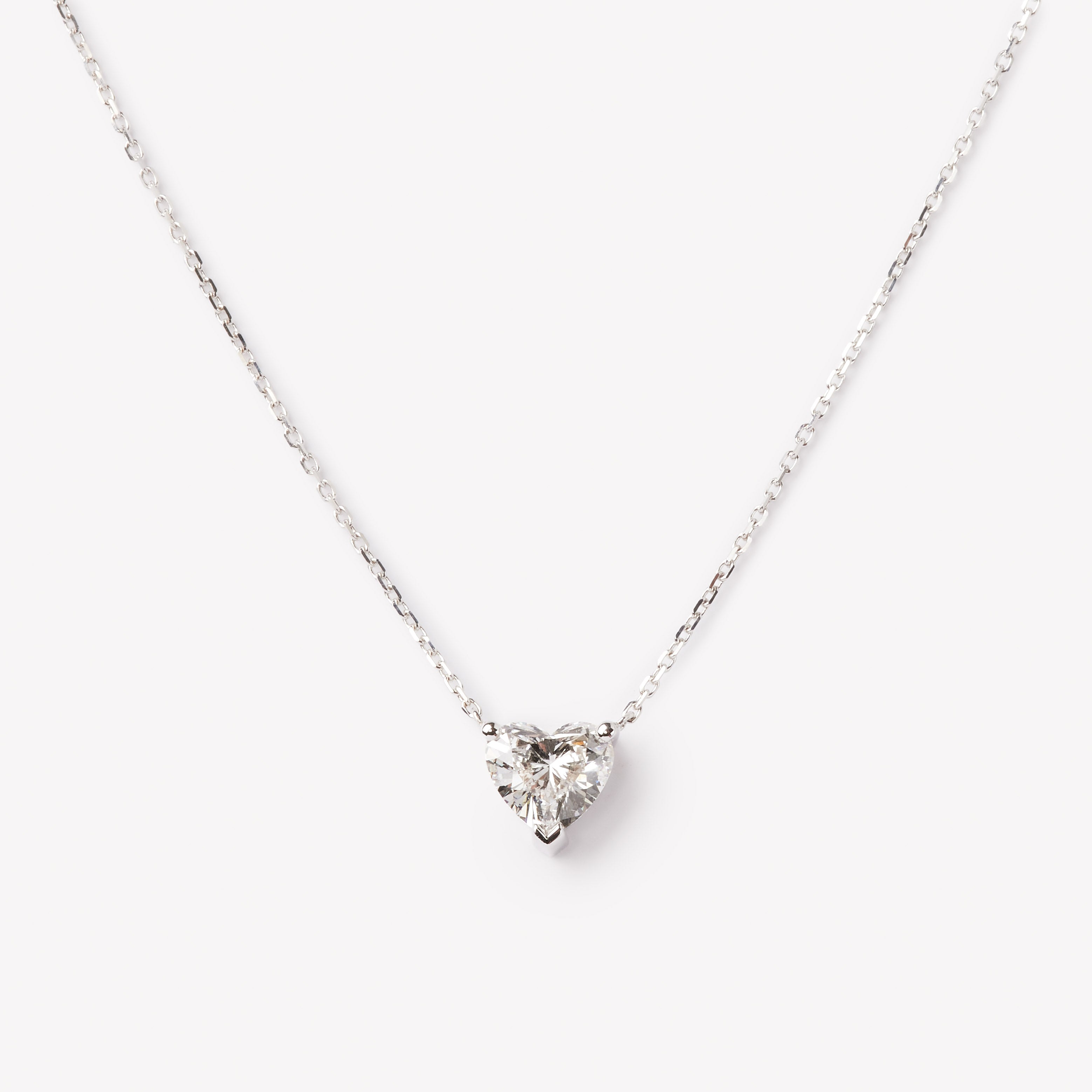 Heart cut necklace by IRALIS featuring lab-grown DEF color diamonds in 18k gold, Zurich designed