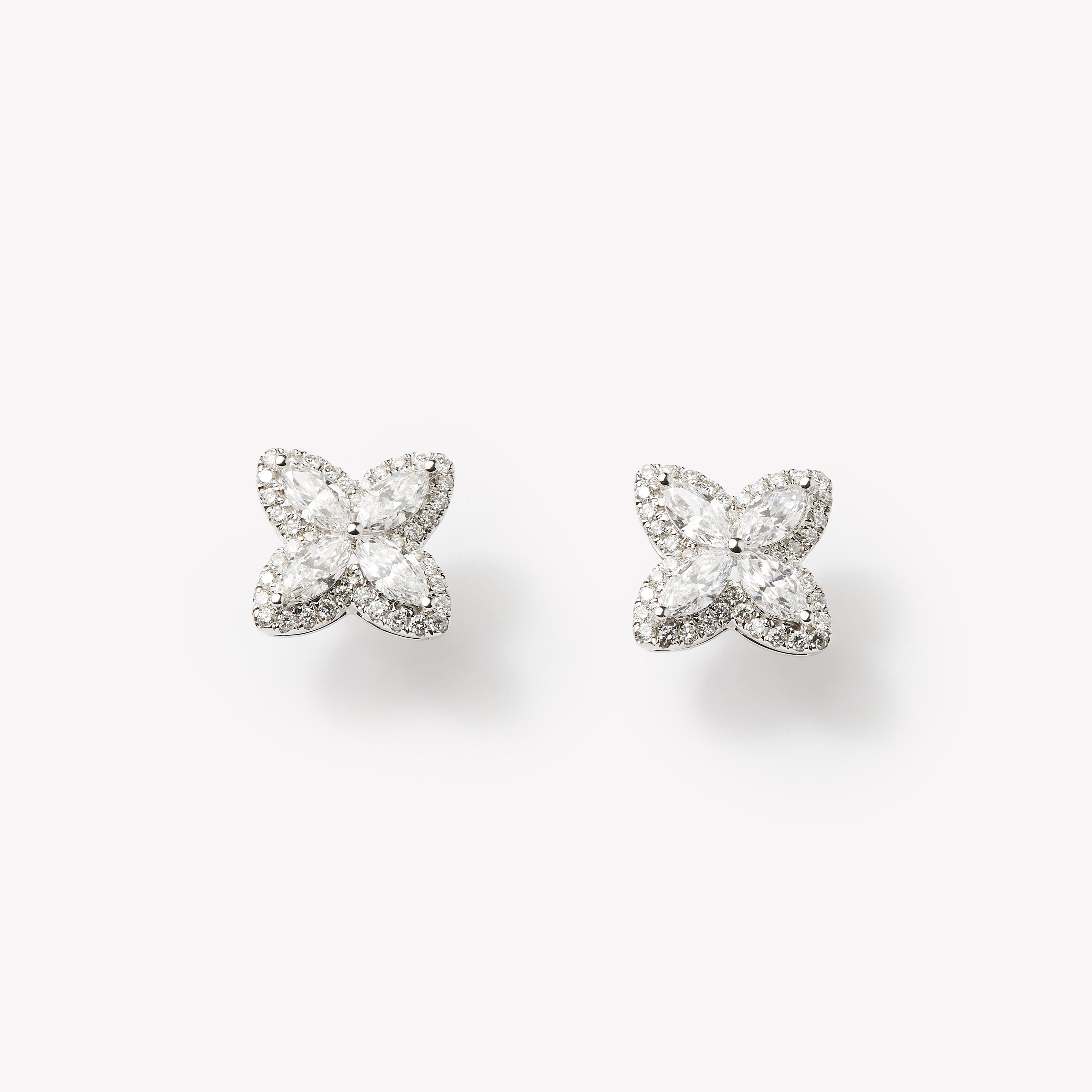 18k white gold lab grown diamond studs. Four marquise cut diamonds embedded in round brilliant cut diamonds.