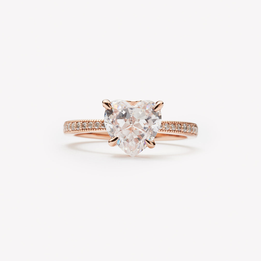 Heart cut engagement ring by IRALIS with pave setting, lab-grown diamonds in DEF color and VS1–VS2 clarity, Zurich designed